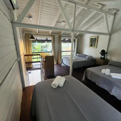 Uma cama ou camas num quarto em Bicycle Chalé