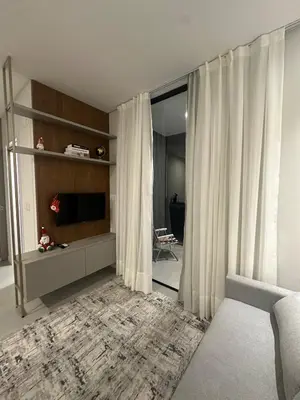 Uma cama ou camas num quarto em Flat novo próximo ao Hard Rock