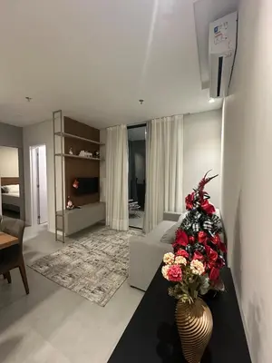 Uma televisão e/ou sistema de entretenimento em Flat novo próximo ao Hard Rock