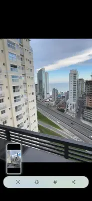 Uma vista geral de Itapema ou a vista da cidade a partir do apartamento