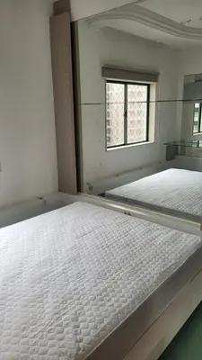 Uma cama ou camas num quarto em Cobertura -Itapema
