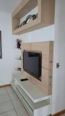 Uma televisão e/ou sistema de entretenimento em Cobertura -Itapema