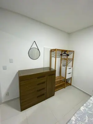 Uma cama ou camas num quarto em Casa de temporada Bombinhas