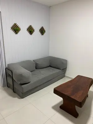 Uma área de estar em Casa de temporada Bombinhas