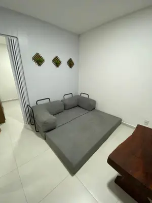 Uma área de estar em Casa de temporada Bombinhas
