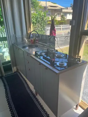 A cozinha ou kitchenette de Casa Vidro Mar