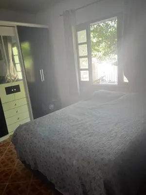 Uma cama ou camas num quarto em Casa Vidro Mar