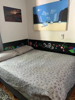 Uma cama ou camas num quarto em Casa Vidro Mar