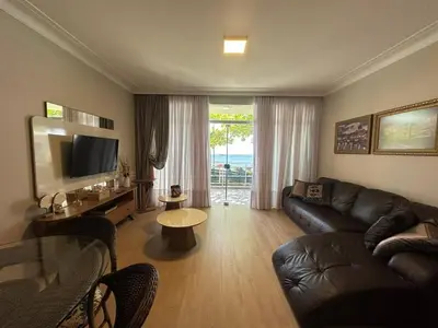 Uma televisão e/ou sistema de entretenimento em Achei Itapema • Mariluz Residencial, R.269
