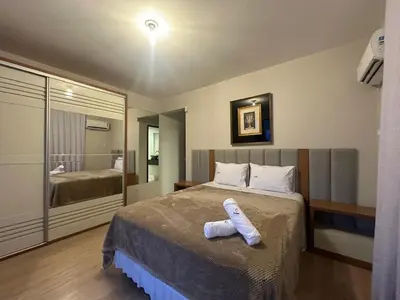 Uma cama ou camas num quarto em Achei Itapema • Mariluz Residencial, R.269
