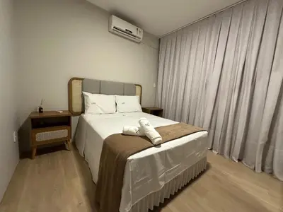 Uma cama ou camas num quarto em Achei Itapema • Mariluz Residencial, R.269