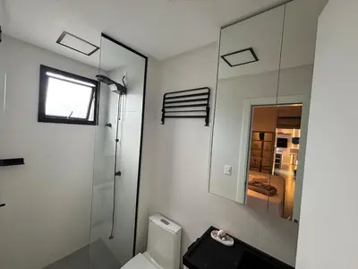Uma casa de banho em Vista Mar & Conforto | Flat Moderno com Suíte King