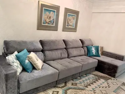 Uma área de estar em Apartamento 4 quartos na Meia Praia