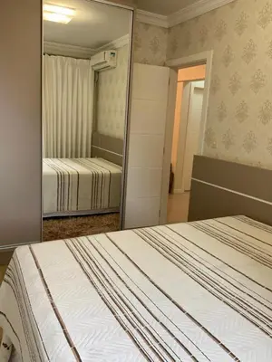 Uma cama ou camas num quarto em Apartamento 4 quartos na Meia Praia