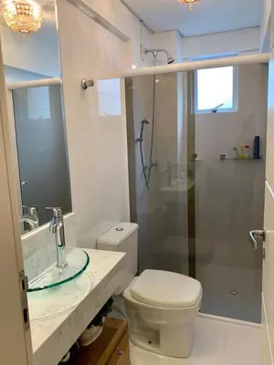 Uma casa de banho em Apartamento 4 quartos na Meia Praia