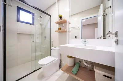 Uma casa de banho em Apartamento alto padrão 2 suítes com piscina