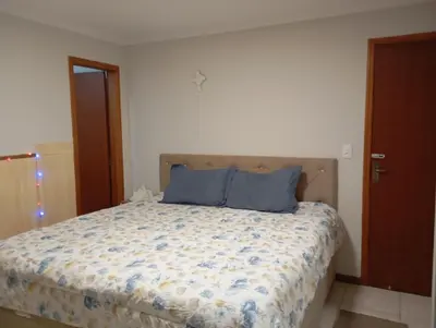 Uma cama ou camas num quarto em balneário a melhor do brasil