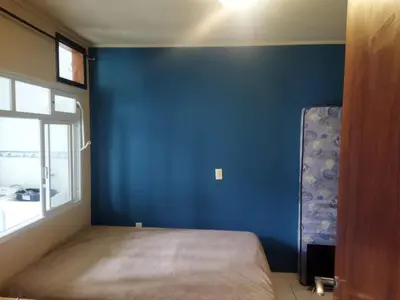 Uma cama ou camas num quarto em Apartamento com a melhor localização de Itapema