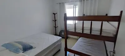 Uma cama ou camas num quarto em Casa Família Feliz Espaço, Conforto e Próximo a Praia