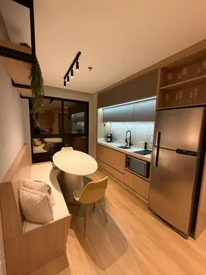 Uma área de estar em Lindo Flat na rua da Praia - Meia Praia Itapema