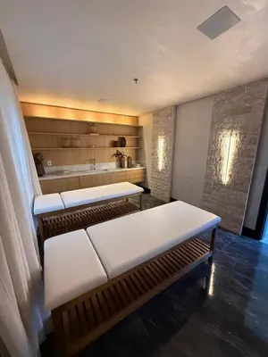 Uma cama ou camas num quarto em Lindo Flat na rua da Praia - Meia Praia Itapema