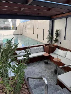 Uma área de estar em Lindo Flat na rua da Praia - Meia Praia Itapema