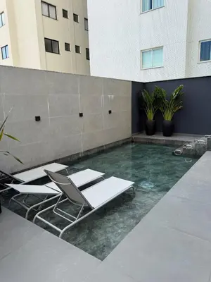 A piscina em ou perto de Lindo Flat na rua da Praia - Meia Praia Itapema