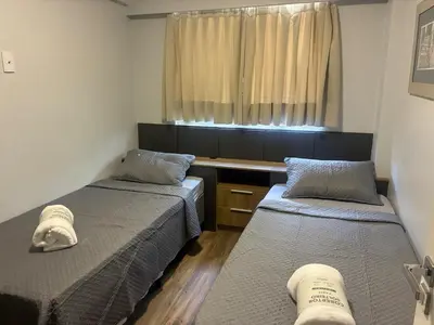 Uma cama ou camas num quarto em Apartamento completo, 2 quartos e estacionamento