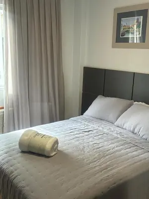 Uma cama ou camas num quarto em Apartamento completo, 2 quartos e estacionamento