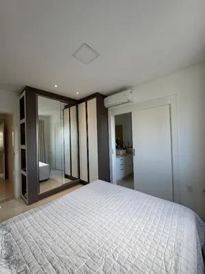 Uma cama ou camas num quarto em Apto Vista Mar Rua 236 Meia Praia Itapema