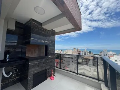 Uma varanda ou terraço em Apartamento na praia de Palmas com vista para o Mar