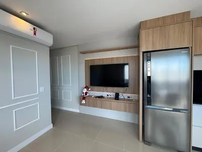 A cozinha ou kitchenette de Apartamento na praia de Palmas com vista para o Mar