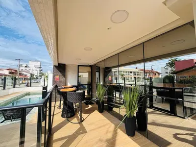 Uma varanda ou terraço em Apartamento na praia de Palmas com vista para o Mar