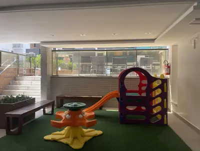 A área de jogos para crianças em Spazio di Palmas 203B - Apartamento no centro de Palmas, a poucos metros do mar.