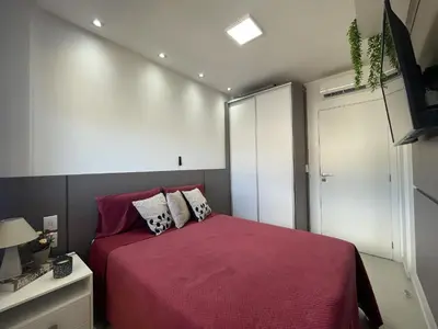 Uma cama ou camas num quarto em Spazio di Palmas 203B - Apartamento no centro de Palmas, a poucos metros do mar.