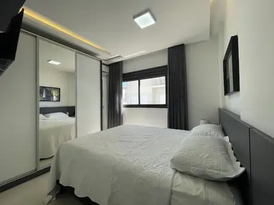 Uma cama ou camas num quarto em Spazio di Palmas 203B - Apartamento no centro de Palmas, a poucos metros do mar.