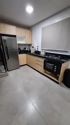 A cozinha ou kitchenette de Residencial da Vila Apartamento 1