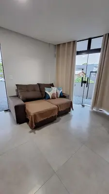 Uma área de estar em Residencial da Vila Apartamento 1