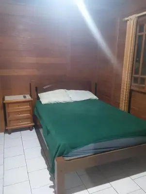 Uma cama ou camas num quarto em Casa de Praia