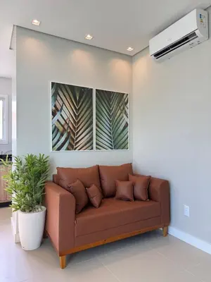 Uma área de estar em Green Home Palmas