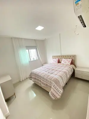 Uma cama ou camas num quarto em Apartamento Tamanho Família