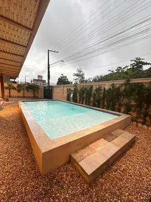 A piscina em ou perto de Casa Pedra e Luz em Bombinhas com piscina aquecida