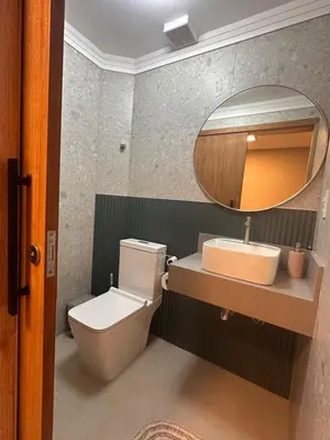 Uma casa de banho em Casa Pedra e Luz em Bombinhas com piscina aquecida