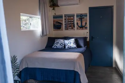 Uma cama ou camas num quarto em Casa A-Mar-Elos 500m Praia Estaleirinho