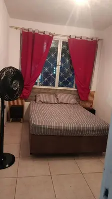 Uma área de estar em Comfortable house for your leisure 210m from the beach