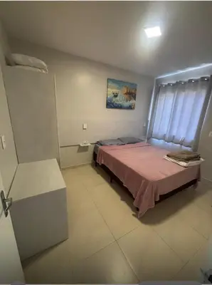 Uma cama ou camas num quarto em Casa de praia em palmas
