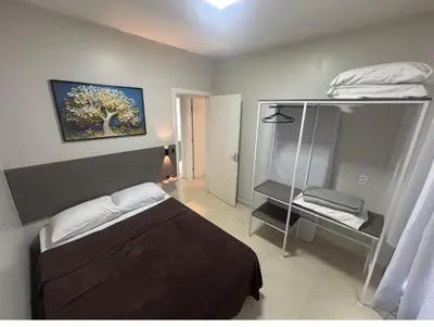 Uma cama ou camas num quarto em Casa de praia em palmas