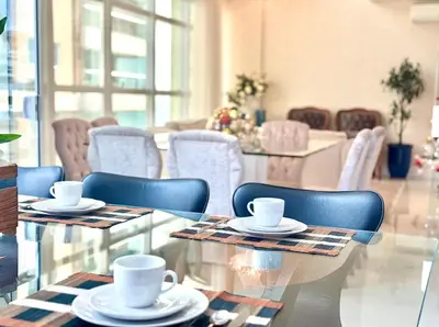 Uma área de estar em Cobertura Duplex com Banheira