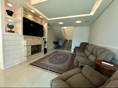 Uma televisão e/ou sistema de entretenimento em Cobertura Duplex com Banheira