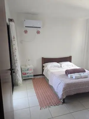 Uma cama ou camas num quarto em Apartamento vista para o mar - Praia do Mariscal